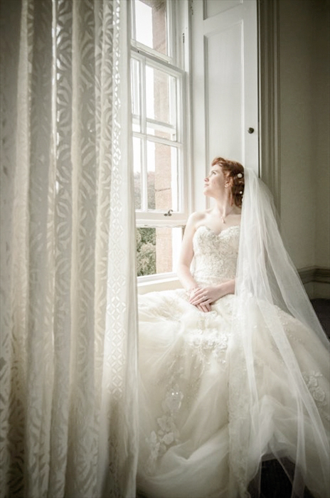 Wedding Photography of Bride at window.